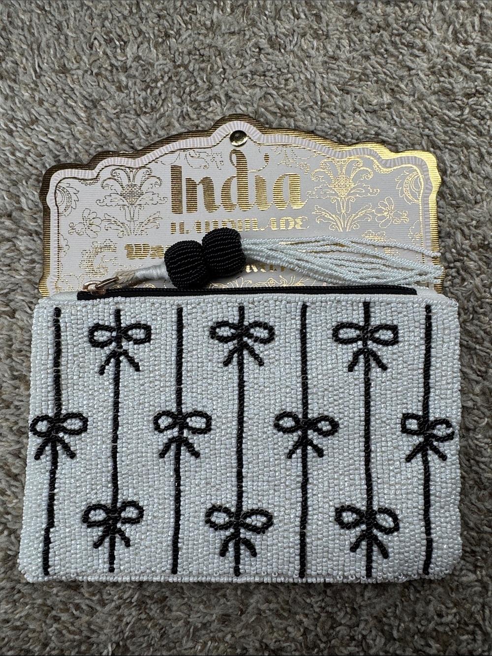 India Hicks White Beaded Pouch with Black Bow Motif